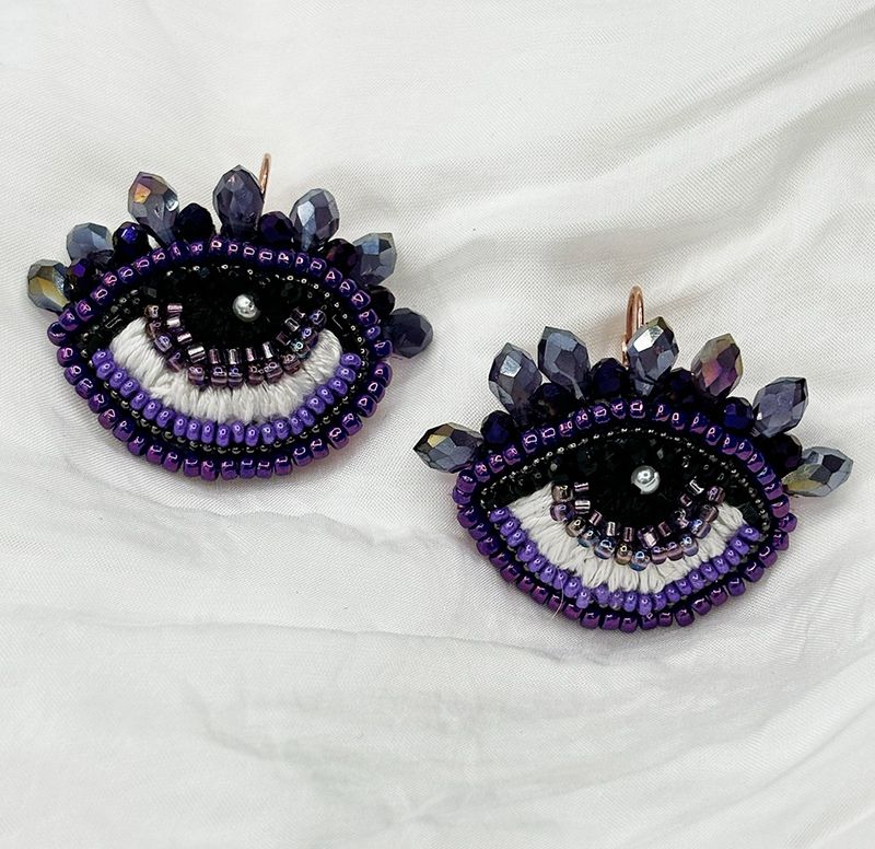 Purple Eye earrings