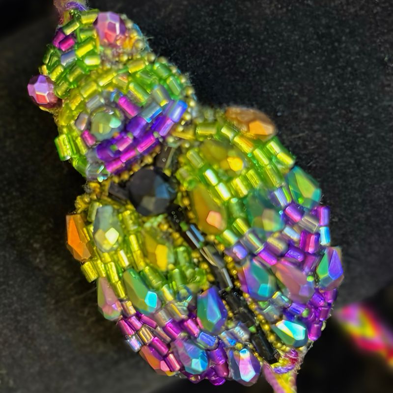 Vibrant green, gold and purple