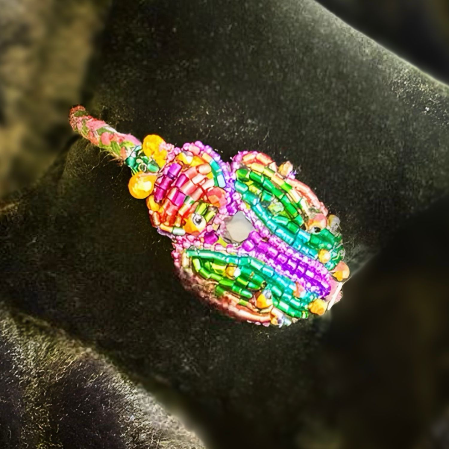 Emerald green, purple and gold