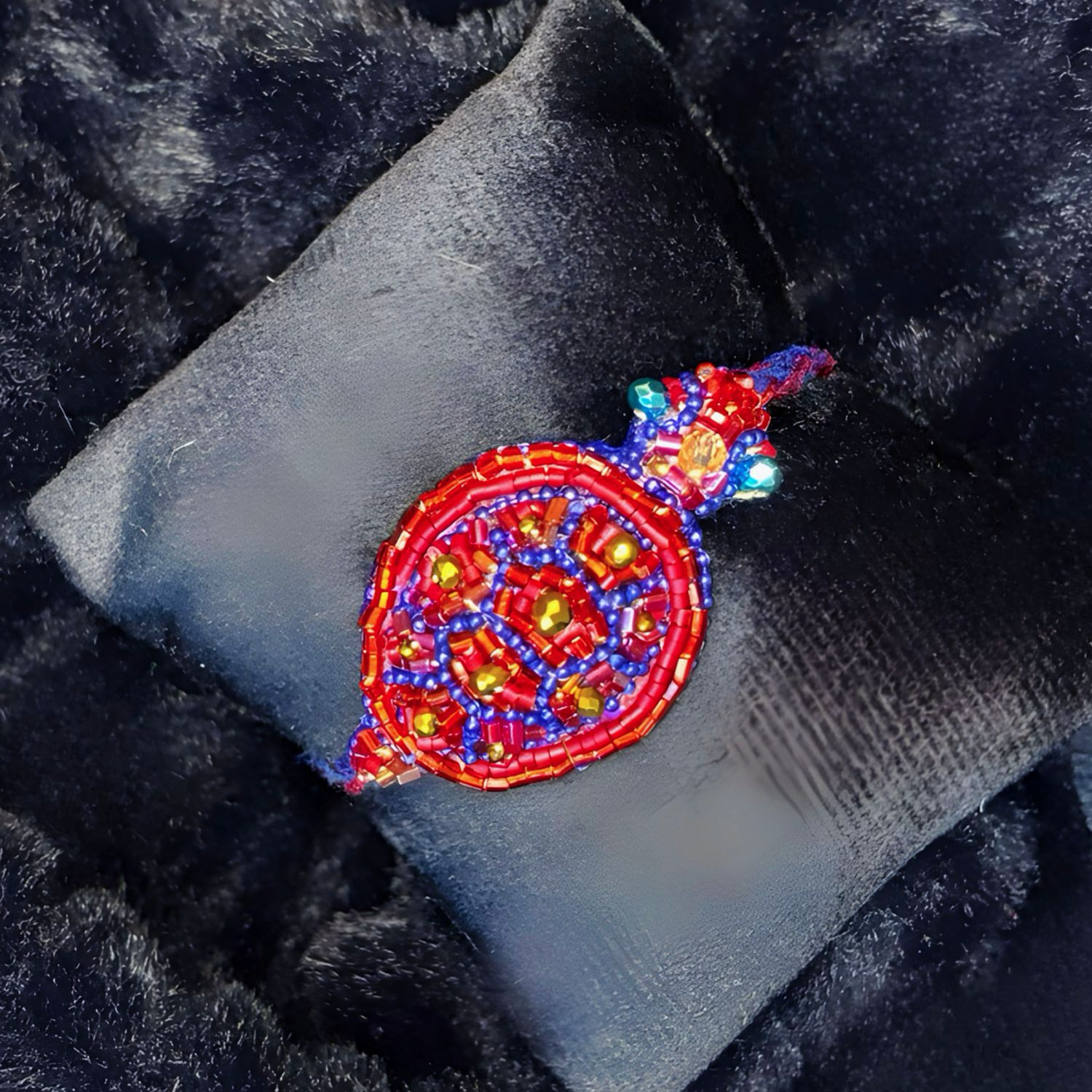 Royal blue, red and bronze