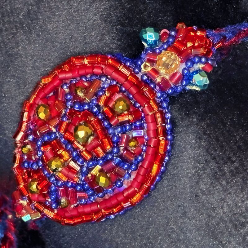 Royal blue, red and bronze