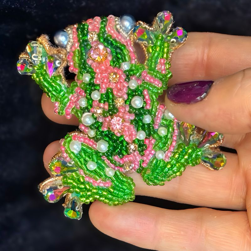 Green and pink frog