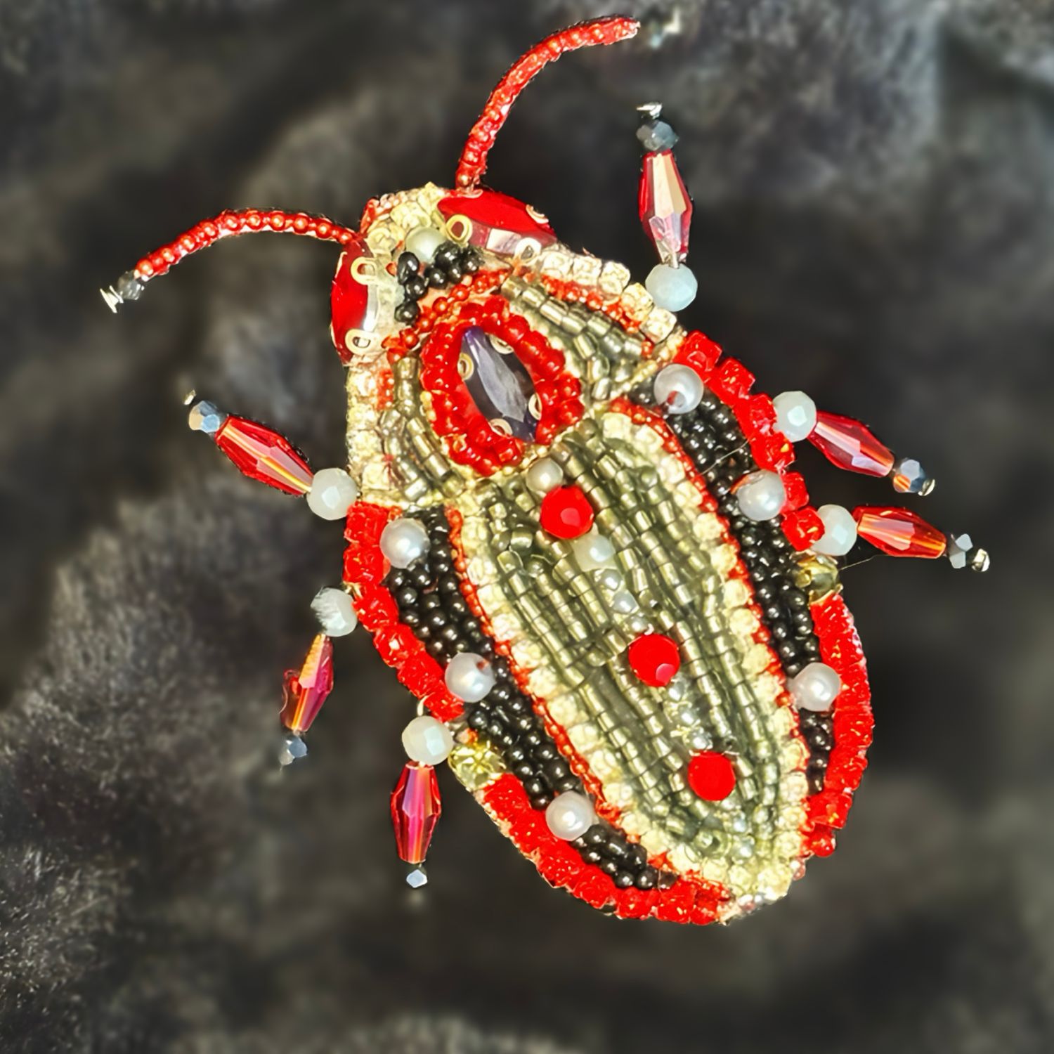 Red, silver and black Beetle