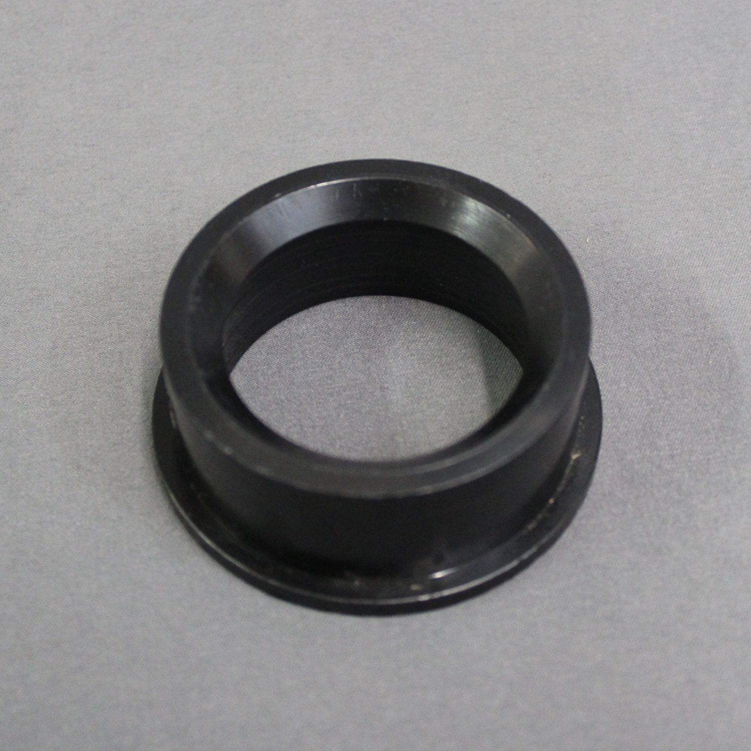 ABS Reducing Flush Bushing 2&quot; Hub x 1 1/2&quot; Spigot