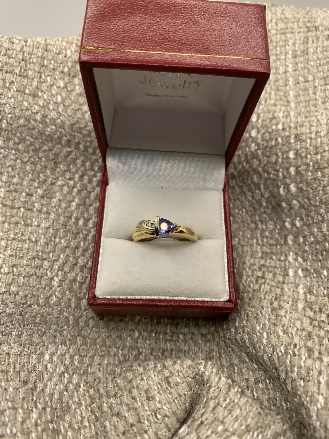 Tanzanite Ring With 3 Round Diamond Accents set in 14K Yellow Gold