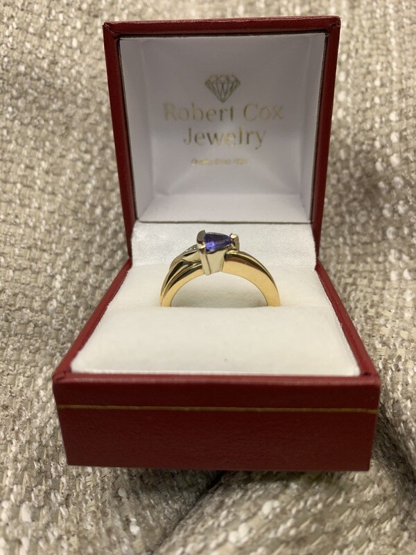 Tanzanite Ring With 3 Round Diamond Accents set in 14K Yellow Gold
