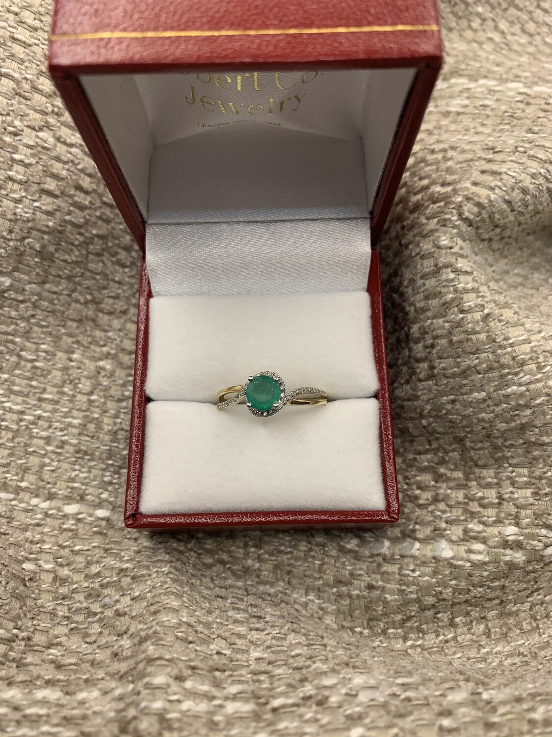 Round Emerald With diamond Accented Ring