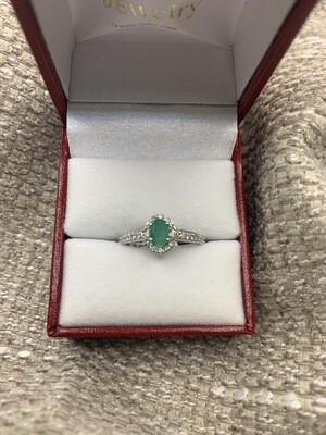Emerald Ring (Oval Genuine Emerald )With .25 Ct. Diamond Accent Set in 14 Kt White Gold
