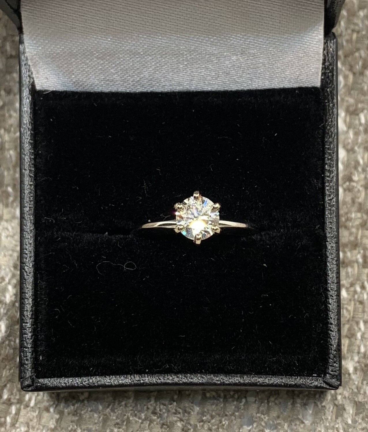 Diamond Engagement Ring (Brilliant Cut ) 75 Pts. Solitaire in a 14Kt. White Gold Setting.