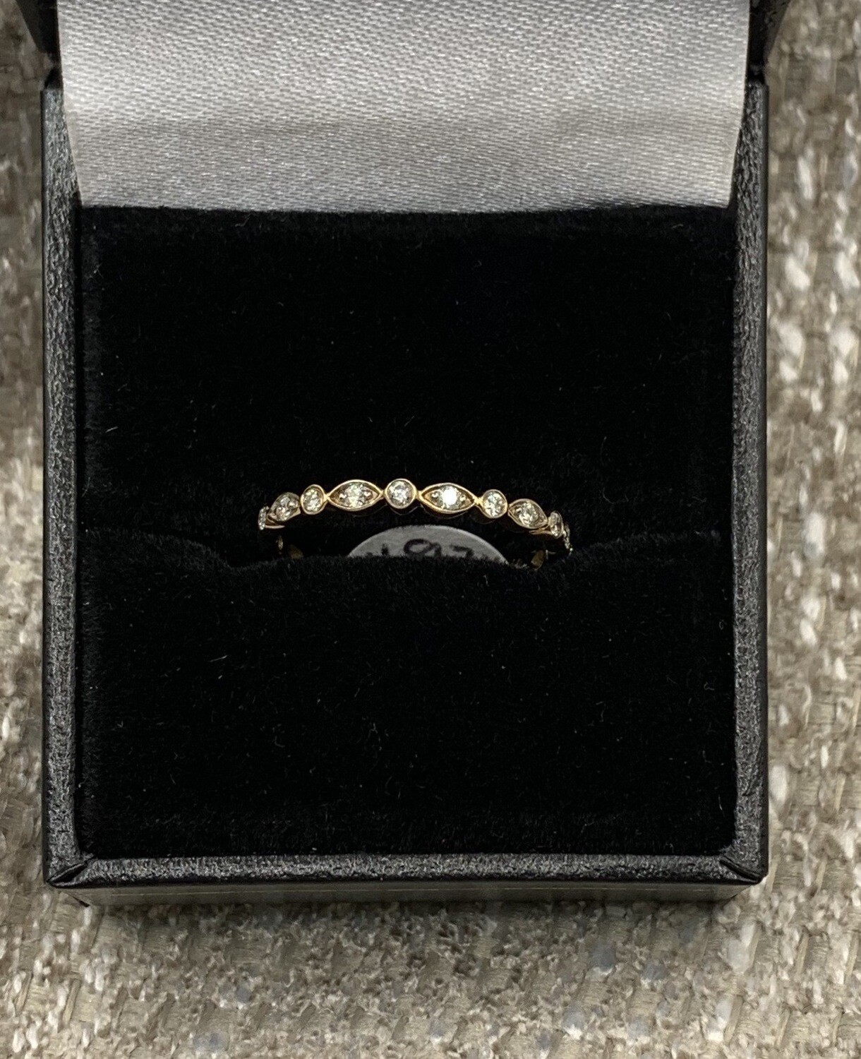 Diamond Band 13 pt. Total Weight set in Yellow Gold.