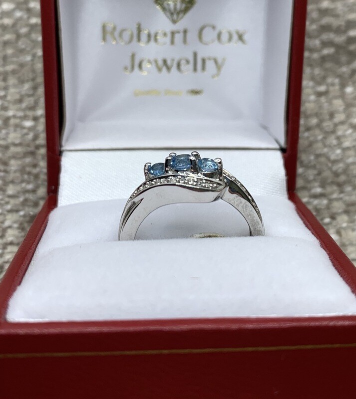 Blue Topaz Ring (3 Genuine Brilliant Cut) with Diamond Accents set in 10 Kt. White Gold