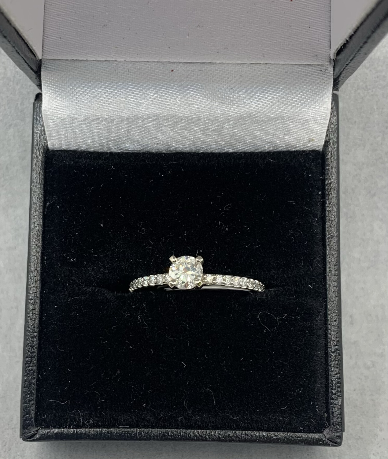 Diamond Engagement Ring Brilliant Center with Diamond Accents (63 Pts. Total Weight) set in 14 Kt. White Gold