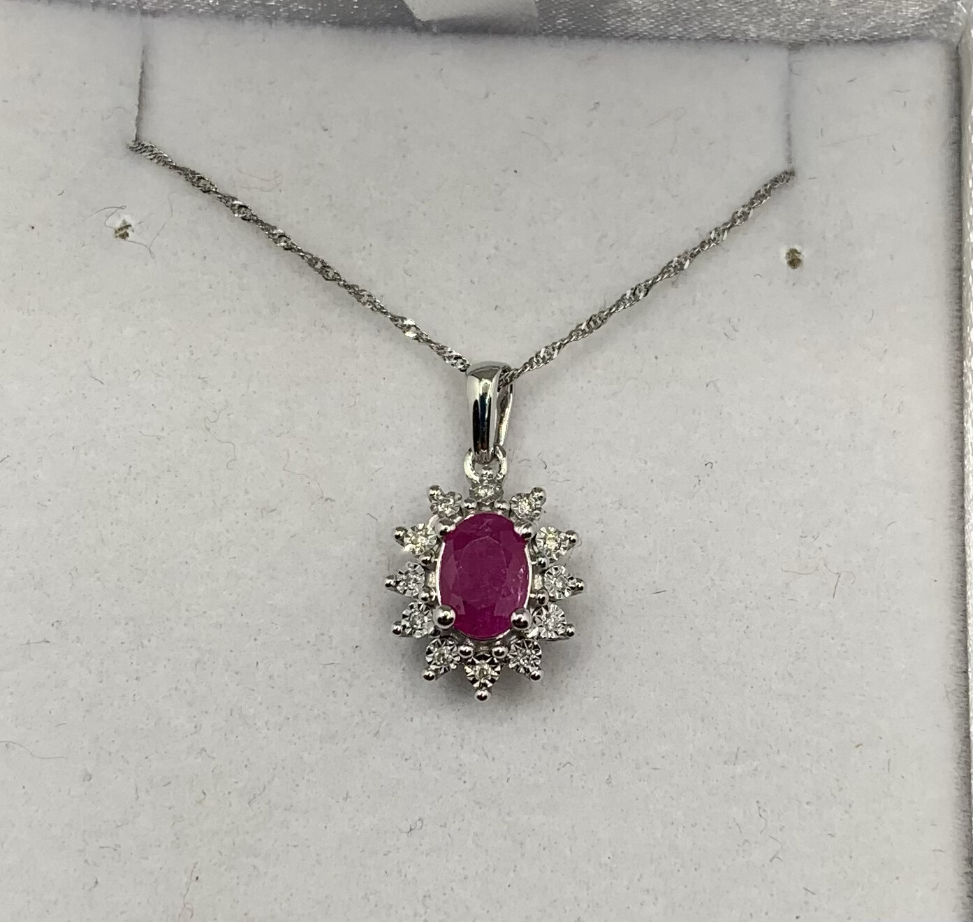 Ruby And Diamond Necklace with a Genuine Oval Shape Ruby set in 14 Kt. White Gold