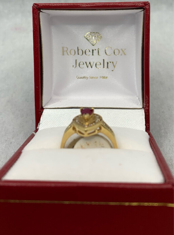 Ruby Ring Pear Shape With Diamond Accents set in 14 Kt Yellow Gold