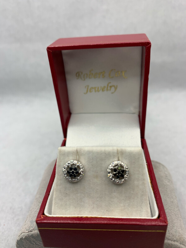 Black and White Diamond Earrings Black Cluster with a White Diamond Halo set in 10 Kt. White Gold.