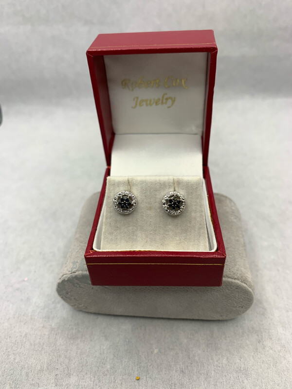 Black and White Diamond Earrings Black Cluster with a White Diamond Halo set in 10 Kt. White Gold.