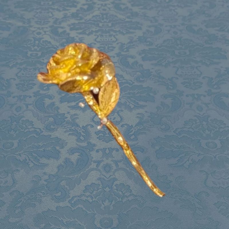 Flor dorada 4×2 cm.