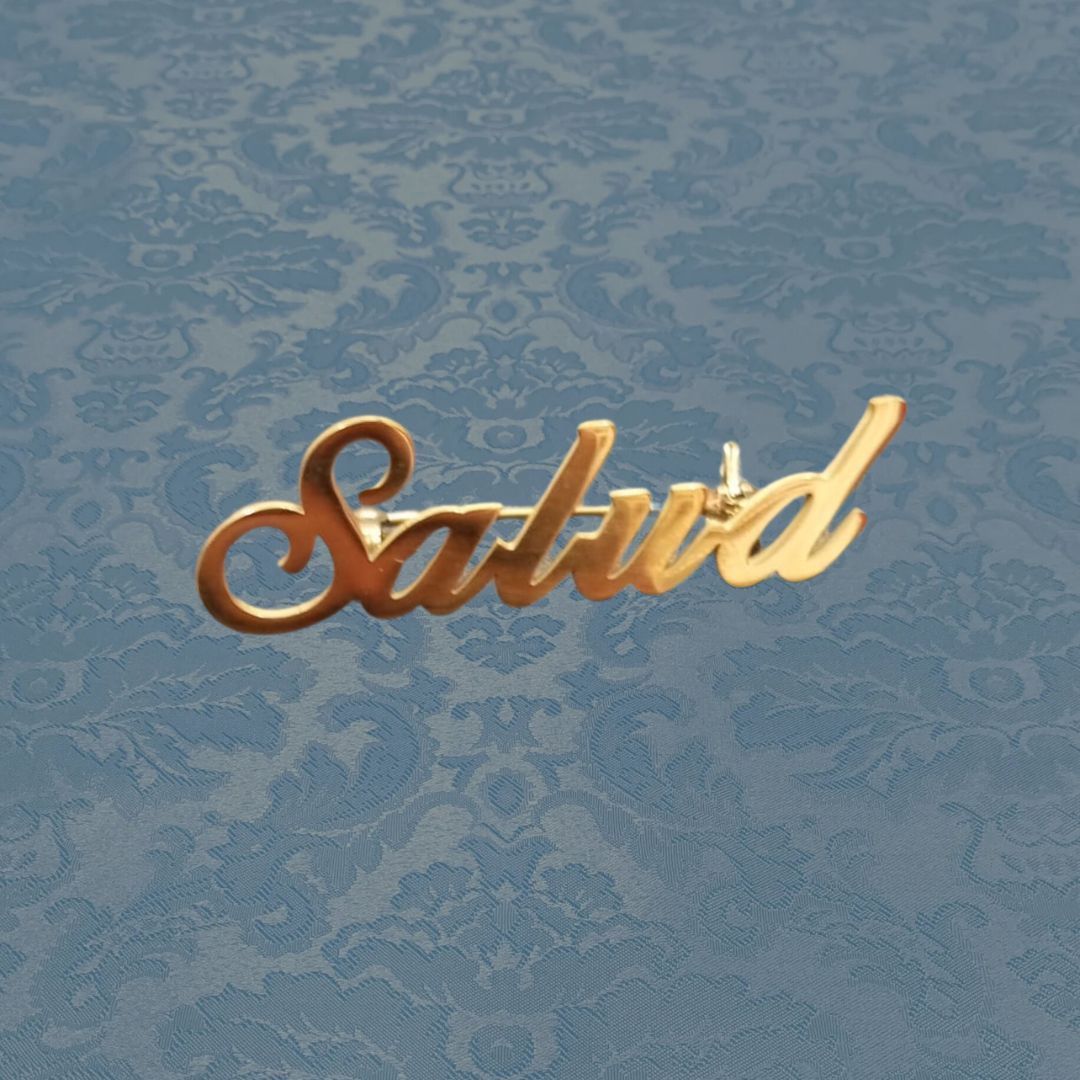 Broche Salud dorado