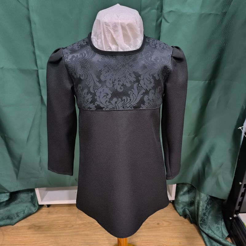 Traje de mantilla infantil