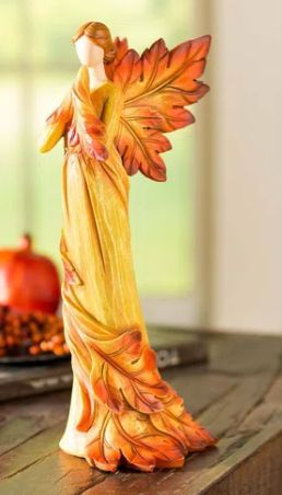 Fall Angel with Leaf Wings and Fiery Hues of Autumn