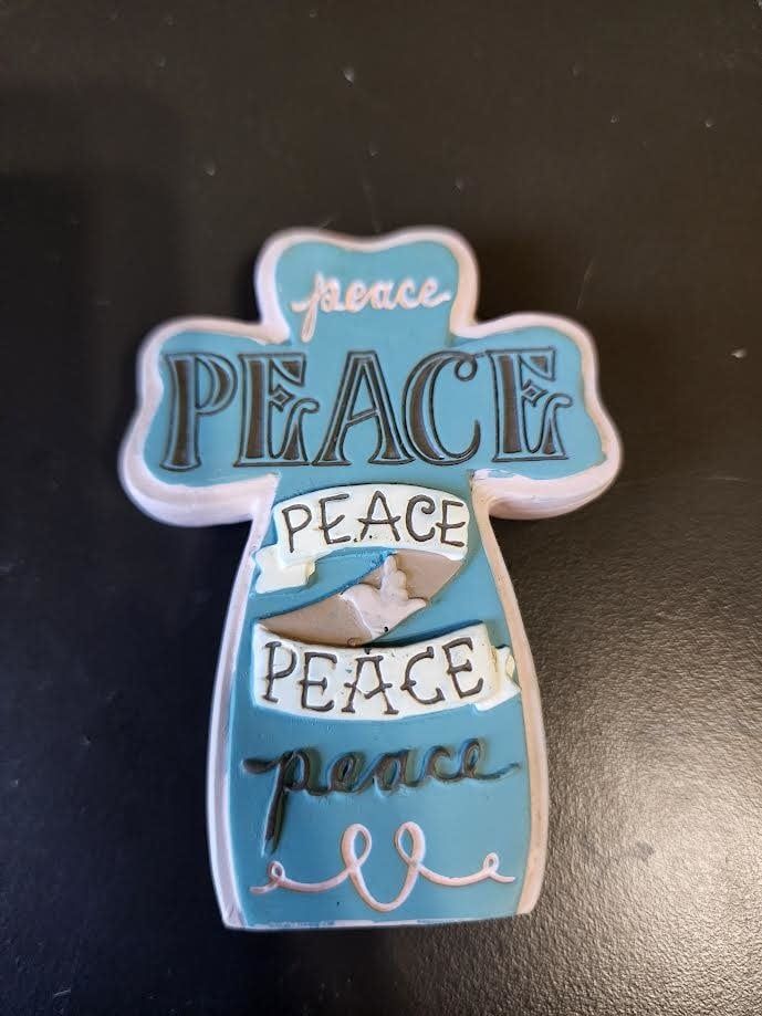 Crosses To Go, Saying: Peace