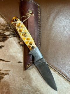 A Classic All-Around Blade Drop Point Damascus Knife