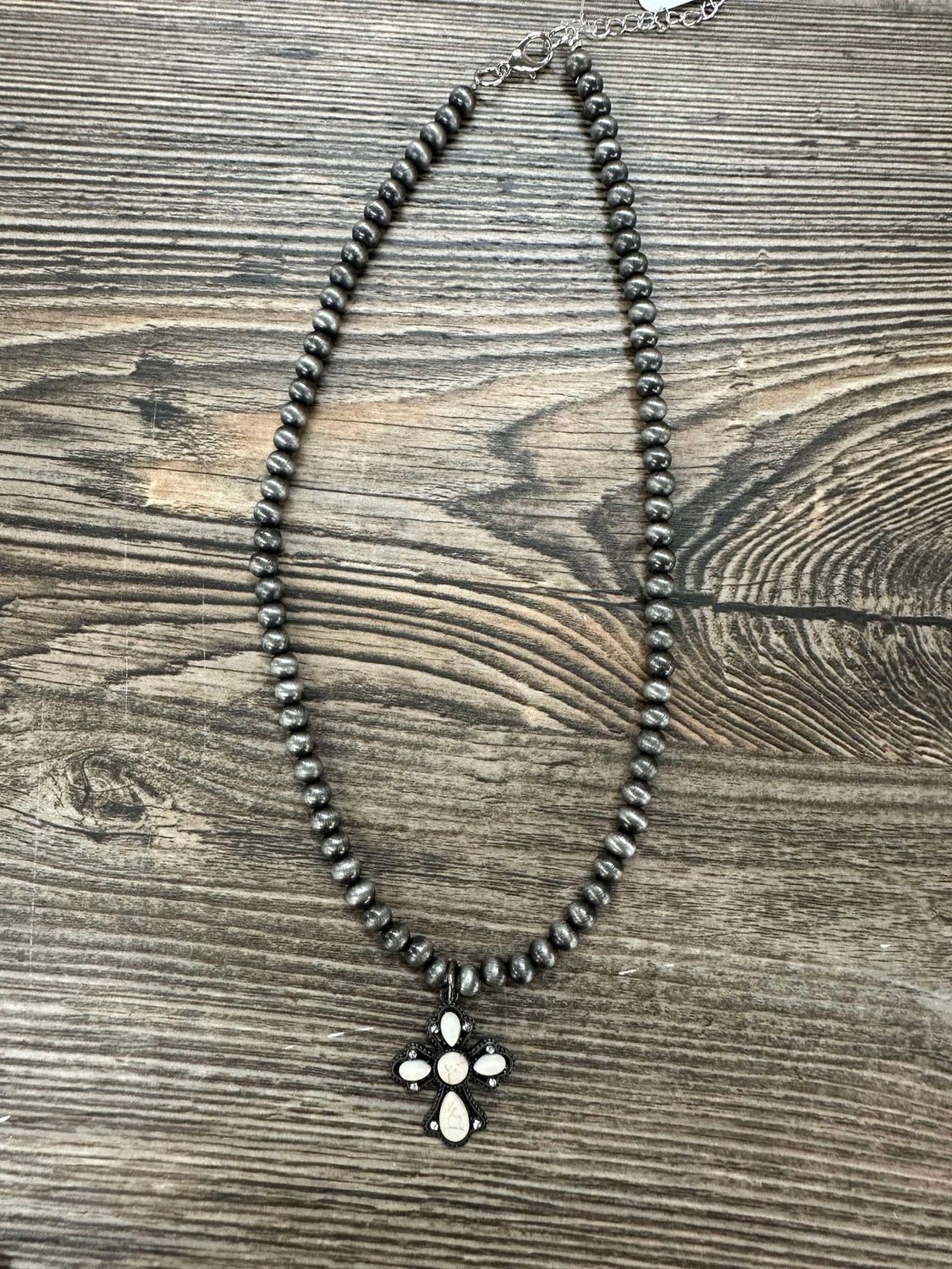 Beaded Necklace with Bone Cross