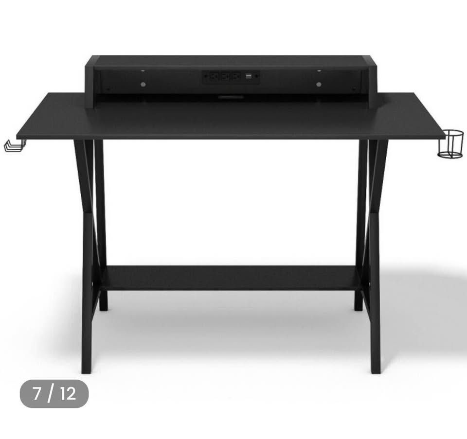 One all in one professional gaming with cup, and headphone holder.