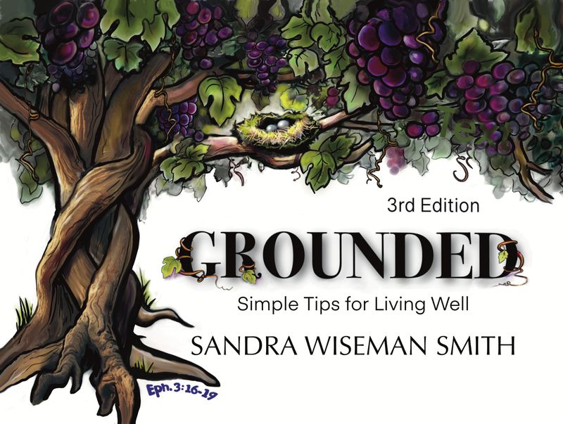 Large brown tree with twisted trunk supporting large branches laden with luscious-looking bunches of grapes & nest w/ 2 eggs.