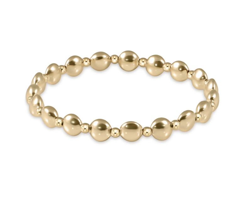 eNewton Honesty Gold Grateful Pattern Bracelet with gold-accented beads and “Grateful” pattern, stretch design