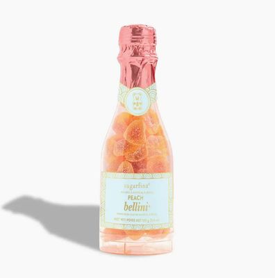 Peach Bellini celebration bottle filled with peach-flavored gummies, festive giftable candy for special occasions

