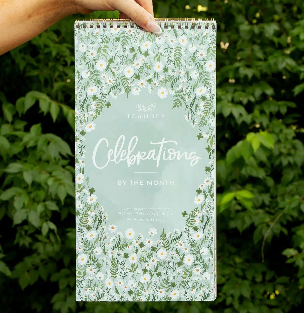 Celebrations by the Month perpetual spiral wall calendar with monthly holidays and events
