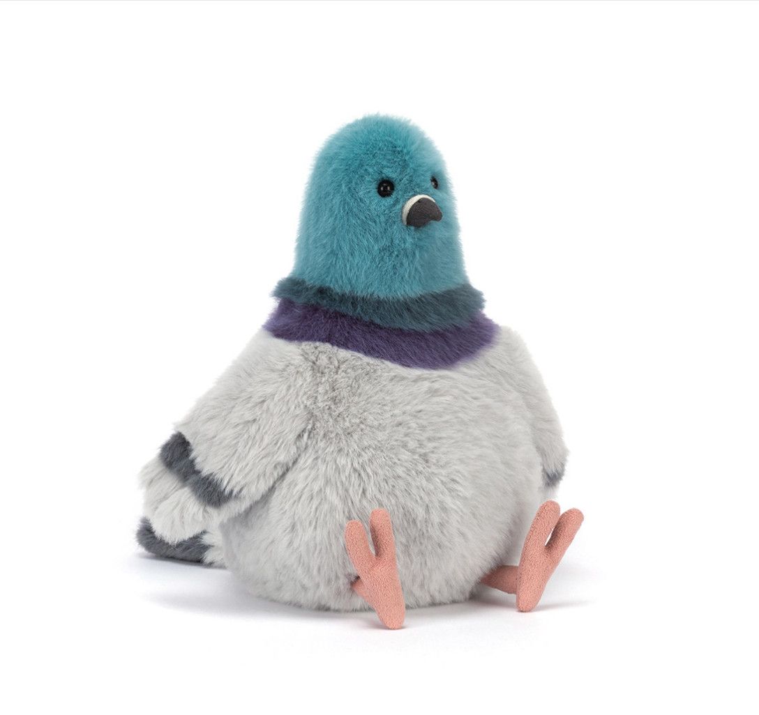 Jellycat Strutton Pigeon plush toy sitting upright with soft gray fur, rounded body, and cute city pigeon design
