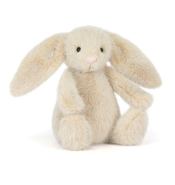 Jellycat Wheat Flufflet Bunny plush with soft neutral fur, floppy ears, and cuddly lightweight design