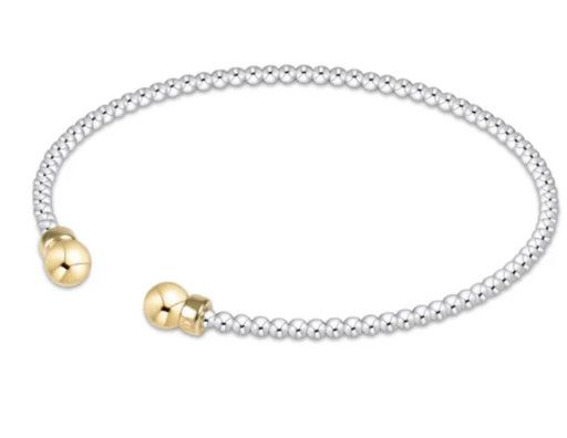 enewton classic mixed metal 2mm bead cuff in gold with delicate gold and silver beads in a sleek open cuff design.
