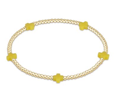 Dainty 2mm gold beaded bracelet with small signature cross charm by enewton, perfect for everyday wear or stacking