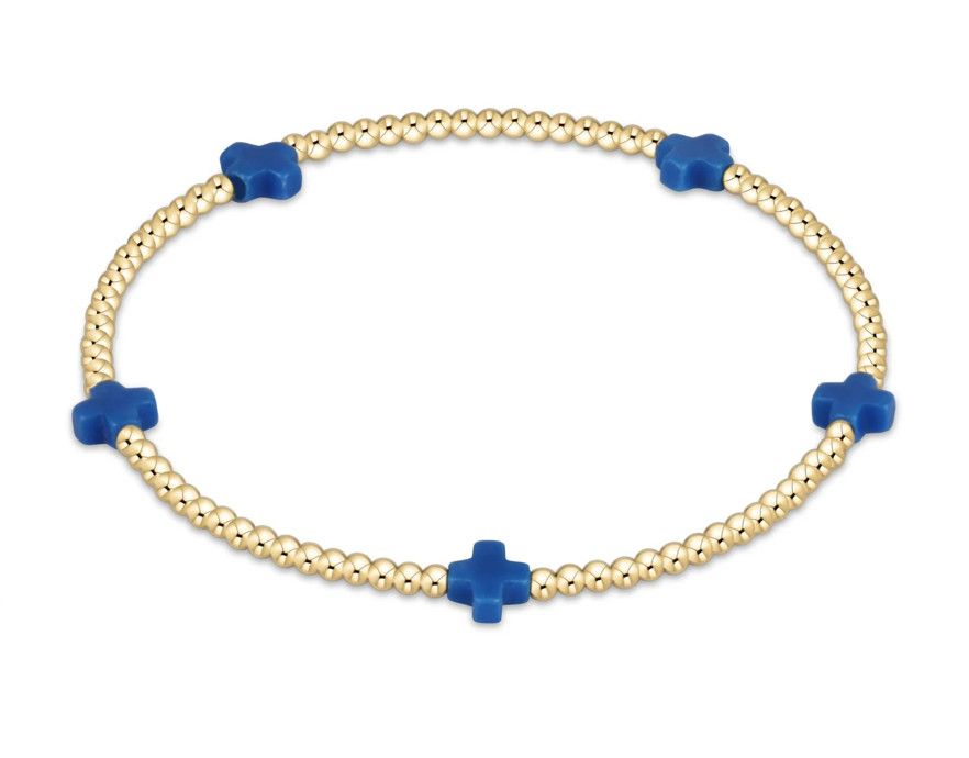 Dainty 2mm gold beaded bracelet with small signature cross charm by enewton, perfect for everyday wear or stacking