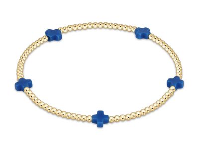 Dainty 2mm gold beaded bracelet with small signature cross charm by enewton, perfect for everyday wear or stacking