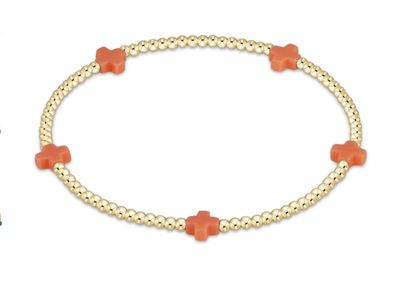 Dainty 2mm gold beaded bracelet with small signature cross charm by enewton, perfect for everyday wear or stacking