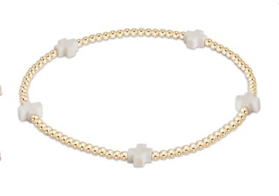 Dainty 2mm gold beaded bracelet with small off-white signature cross charm, delicate faith inspired jewelry for everyday wear