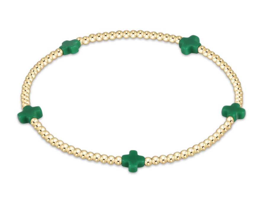 Dainty 2mm gold beaded bracelet with small signature cross charm by enewton, perfect for everyday wear or stacking