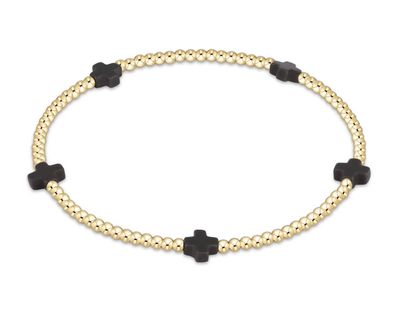 Dainty 2mm gold beaded bracelet with small signature cross charm by enewton, perfect for everyday wear or stacking