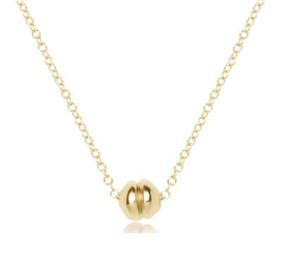 Dainty 16 inch gold necklace with a small polished pendant in a minimalist design, perfect for everyday wear or layering.