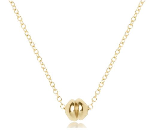 Dainty 16 inch gold necklace with a small polished pendant in a minimalist design, perfect for everyday wear or layering.
