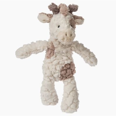 Putty Nursery giraffe plush with ultra-soft neutral fabric and gentle spotted design for babies
