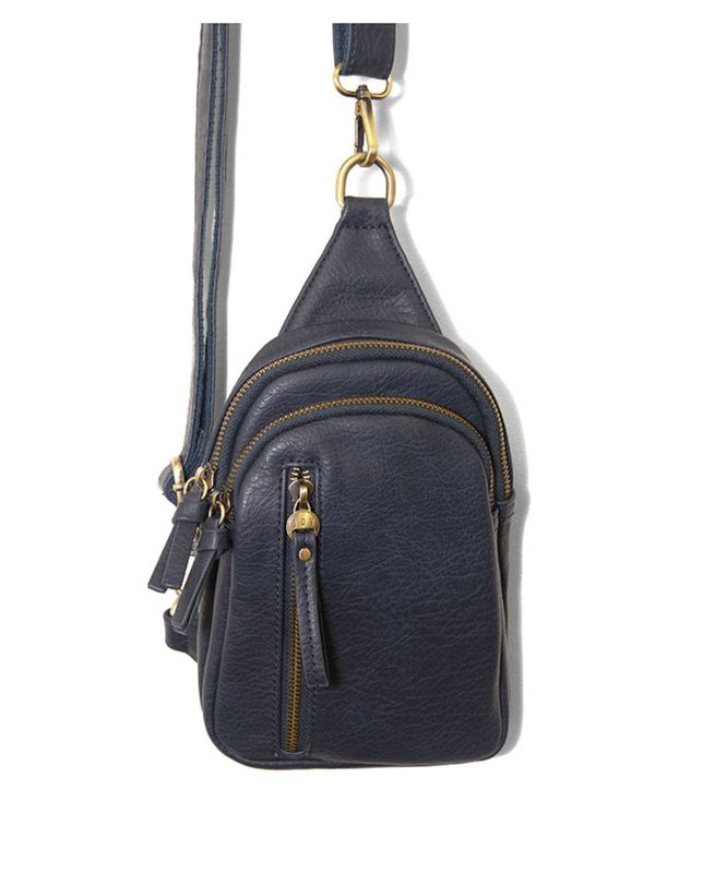 Navy Skyler sling bag with adjustable strap and compact design for everyday essentials
