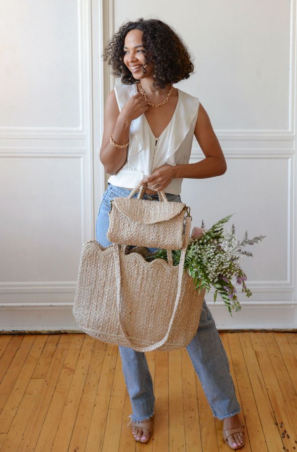 Lala top handle jute crossbody bag with natural woven texture, structured shape, and detachable strap for versatile wear
