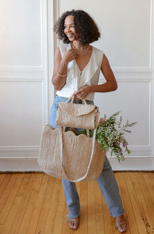 Lala top handle jute crossbody bag with natural woven texture, structured shape, and detachable strap for versatile wear
