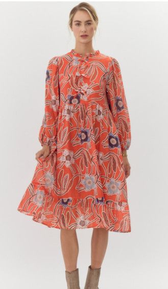Floral print midi dress with frilled neck featuring ribbon-tie, side pockets, long bubble sleeves, and wide ruffly hemline