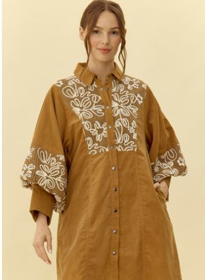 Cotton dress with collared neck and embroidered details.